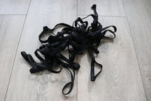 LOT#75 - bundle of black swimwear elastic with grip used on strapless cups.