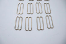 LOT #106 - silver chunky adjusters, bag making accessory