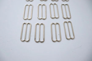 LOT #106 - silver chunky adjusters, bag making accessory
