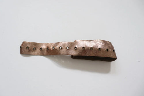 LOT #77 faux leather bronze metallic trim with eyelet detail  just under 2.5 metres