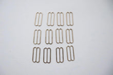 LOT #106 - silver chunky adjusters, bag making accessory