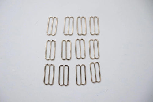LOT #106 - silver chunky adjusters, bag making accessory