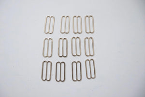 LOT #106 - silver chunky adjusters, bag making accessory