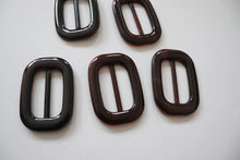LOT #107 - Brown Torteshell chunky adjusters, bag making accesory
