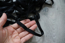 LOT#75 - bundle of black swimwear elastic with grip used on strapless cups.