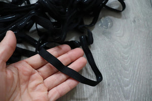 LOT#75 - bundle of black swimwear elastic with grip used on strapless cups.