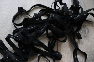LOT#75 - bundle of black swimwear elastic with grip used on strapless cups.