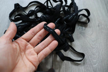 LOT#75 - bundle of black swimwear elastic with grip used on strapless cups.