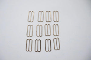 LOT #106 - silver chunky adjusters, bag making accessory