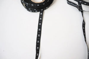 LOT  #101 Garment size labels - Size medium and Large
