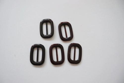 LOT #107 - Brown Torteshell chunky adjusters, bag making accesory