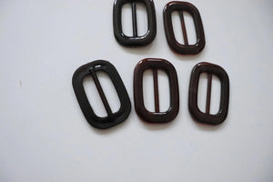 LOT #107 - Brown Torteshell chunky adjusters, bag making accesory