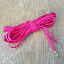 Bright fuchsia pink polyester lacing for corsets stays or shoes with the ends finished with metal aglets