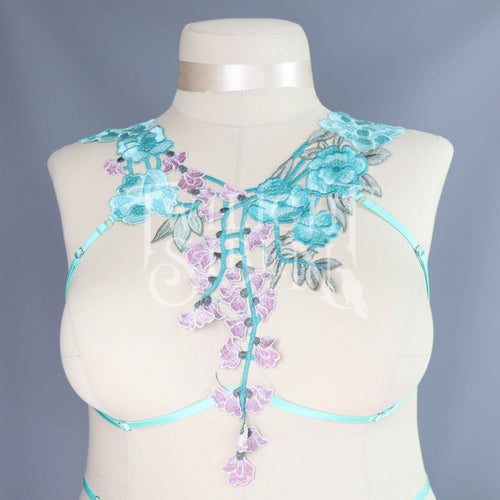 Teal mint green floral lace body harness shown on a plus size mannequin.